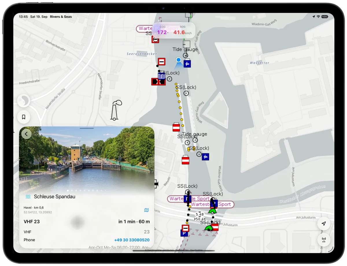 Lock details on iPad with a photograph, VHF channel, and phone number.